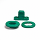 Green plastic snap fastener components on white background