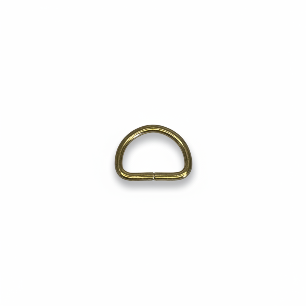 Antique brass D-ring on brilliant white background